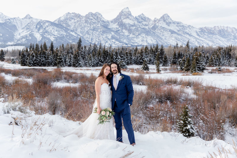 Winter wedding couple in front of the Tetons 
