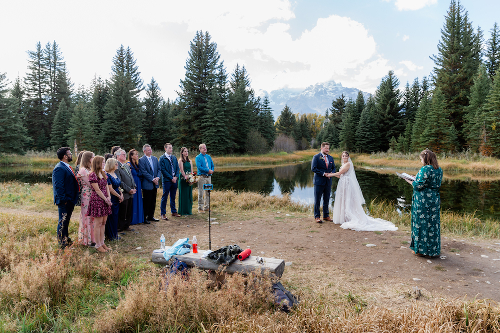 An intimate wedding ceremony at Schwabacher Landing in the Tetons
